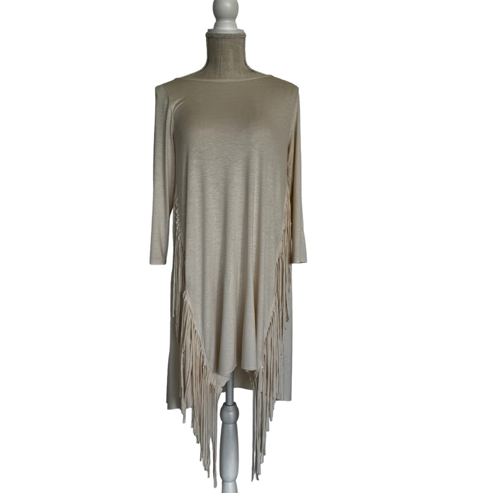 Cream colored loose fitted tunic with fringes in size small